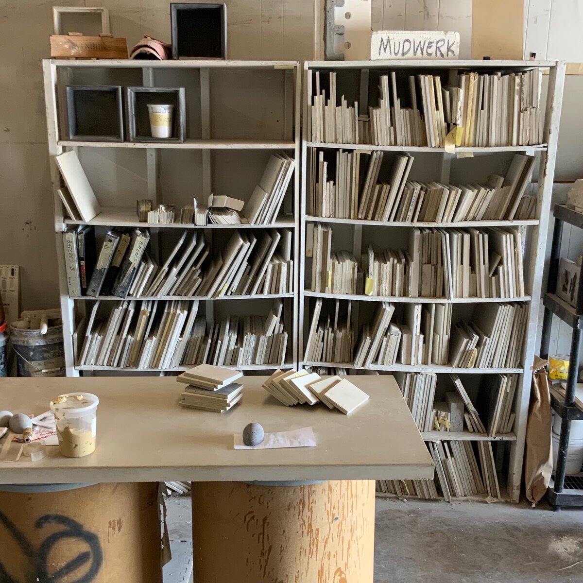 Hand-finished plaster library with curved shelving